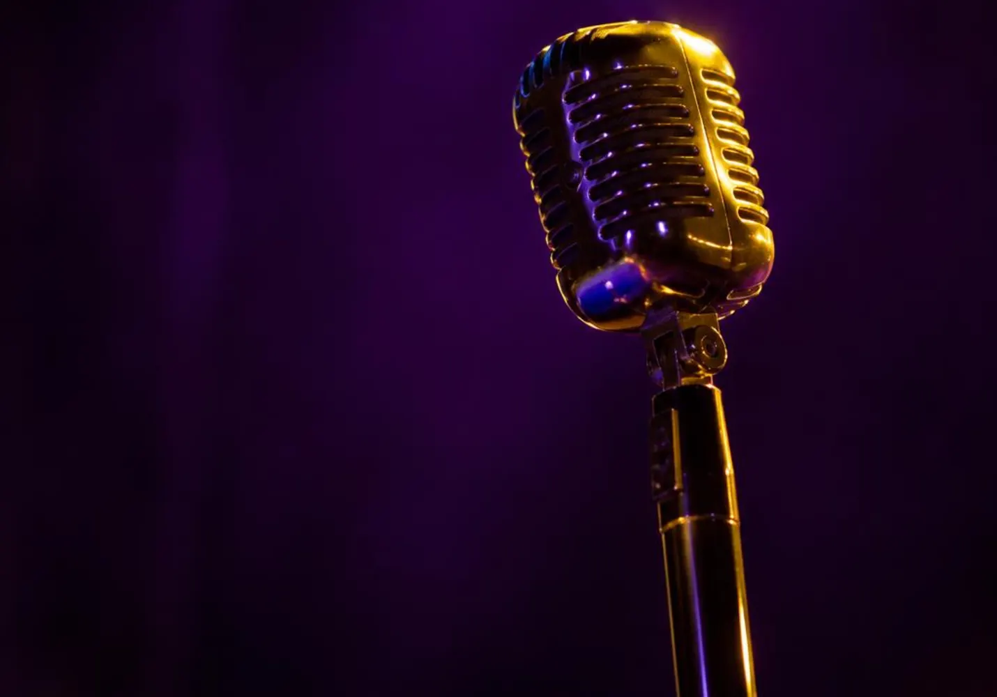 Close-up of a chrome stage microphone